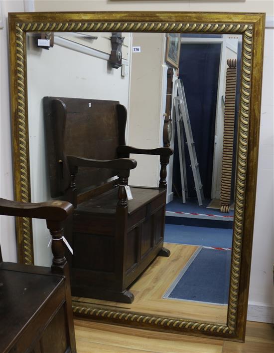 A large gilt wall mirror W.106cm.